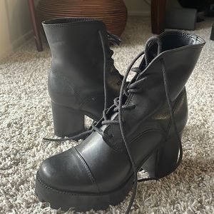 Black boots with a heel. Only work these once or twice! Comfortable and edgy.